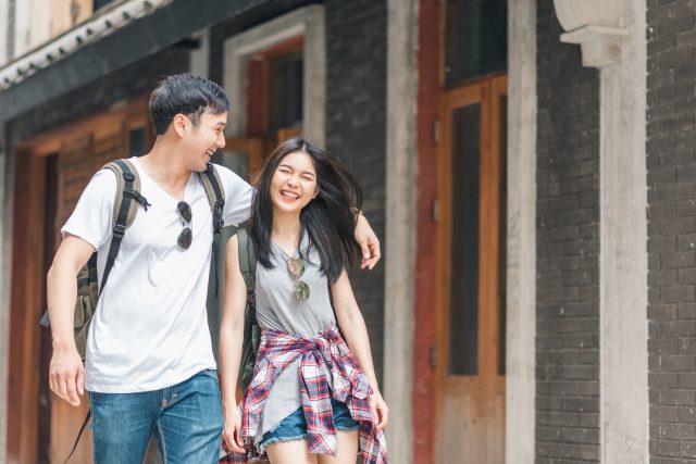 Traveler Asian backpacker couple feeling happy traveling in Beij